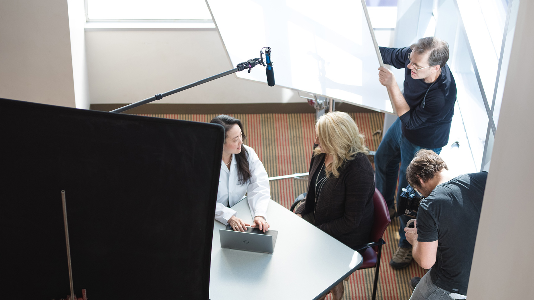 The Stonecastle production team films a scene with a Vanderbilt doctor and patient